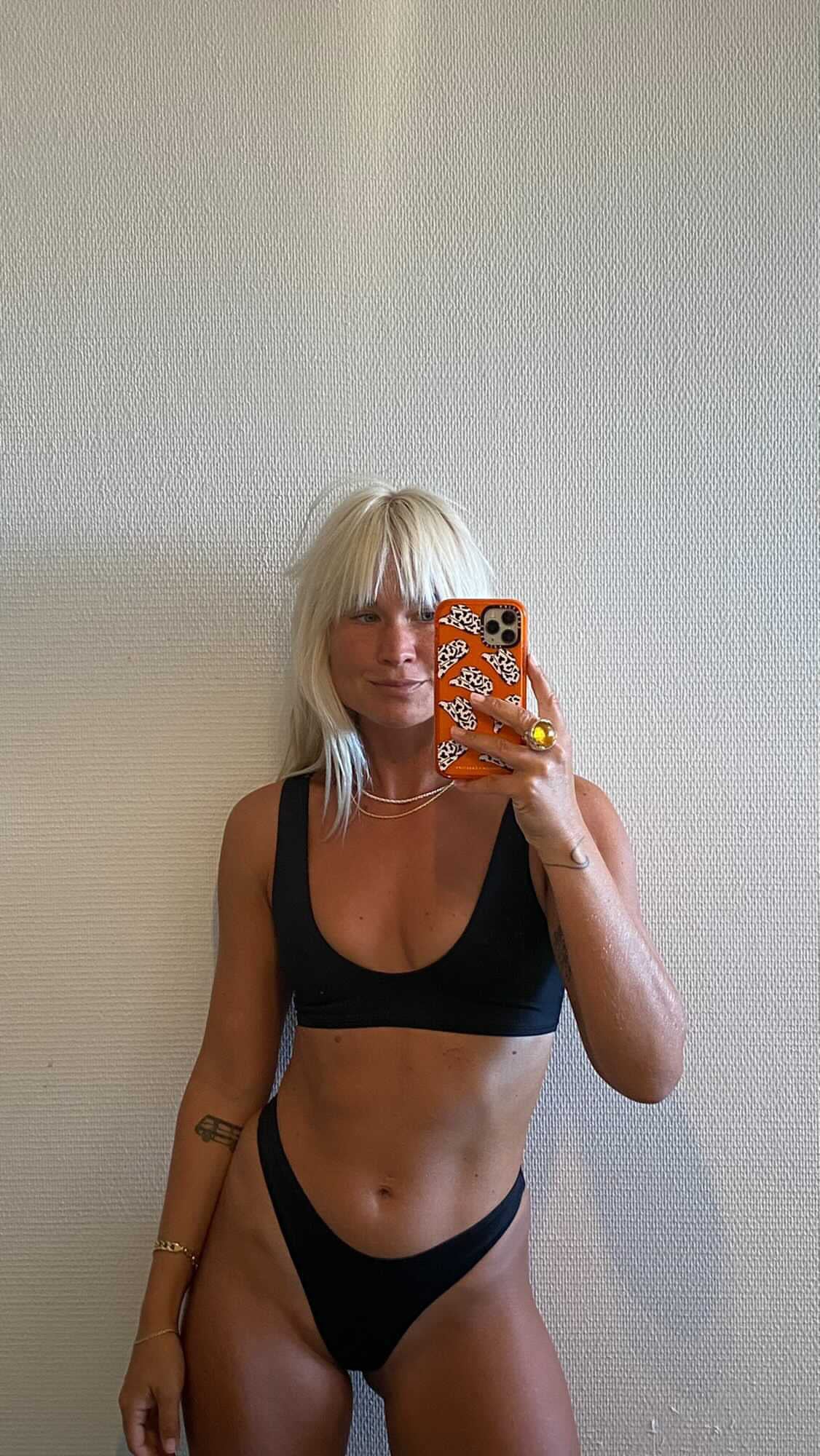 Bold and chic—Tumla’s true black bikini, worn by a blonde, delivers the perfect balance of comfort, durability, and high-end style