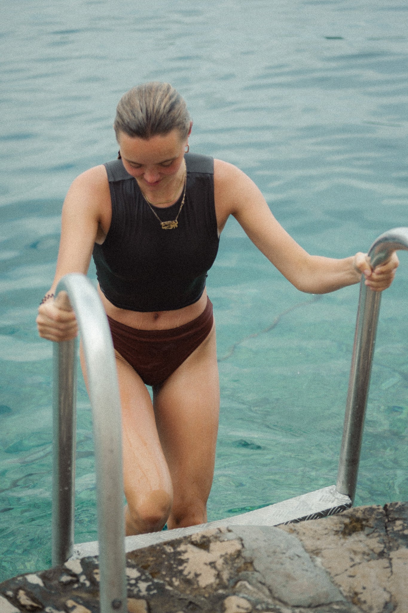 Effortlessly stylish—Tumla’s brown bikini, worn by a blonde, moves with you, offering the perfect balance of durability and elegance